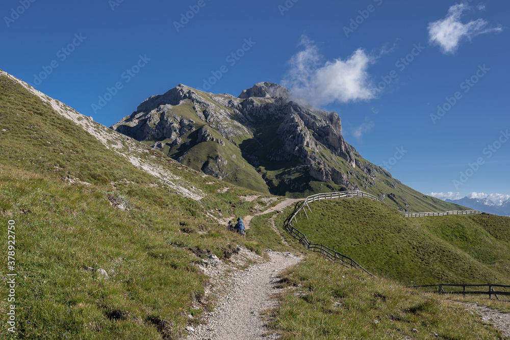 South face of Sass de Putia/Peitlerkofel solitary Dolomites mountain as seen from the circular trail around Sass de Putia down to Passo delle Erbe from Genova refuge, Trentino, South Tirol, Italy.