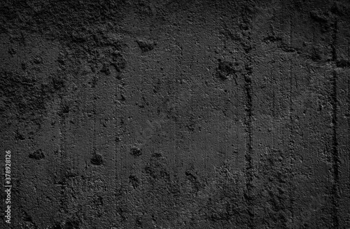 Dark grey black textured background. Black grunge cement wall texture for interior design. © olenatur