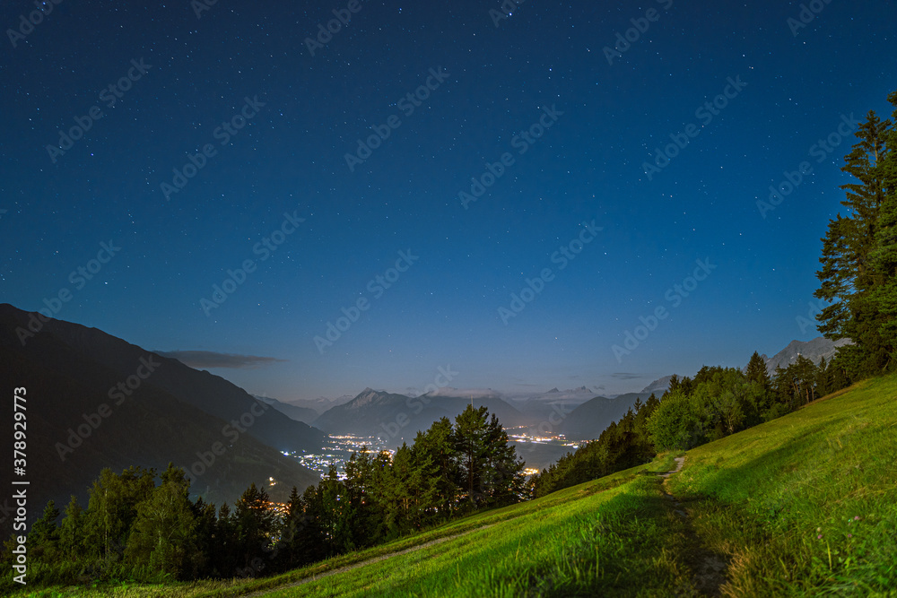 Obraz premium Landscape with Starry Sky over The Mountains