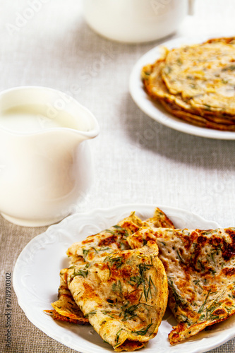 pancakes with milk and herbs