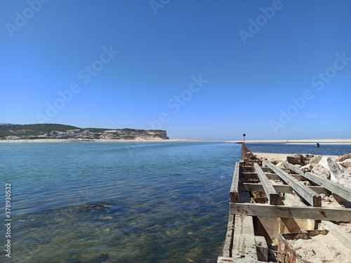 wooden bridge over the sea