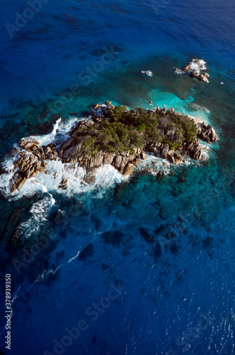 Aerial panorama of the Marine reserve of Coco island with the blue Indian Ocean, Seychelles © MF1688
