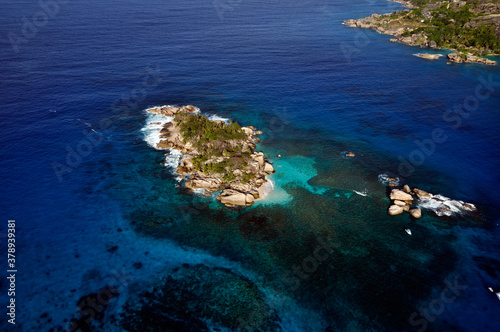Aerial panorama of the Marine reserve of Coco island with the blue Indian Ocean, Seychelles © MF1688