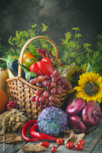 The table  decorated with vegetables and fruits. Harvest Festival Happy Thanksgiving. Autumn background. Selective focus.