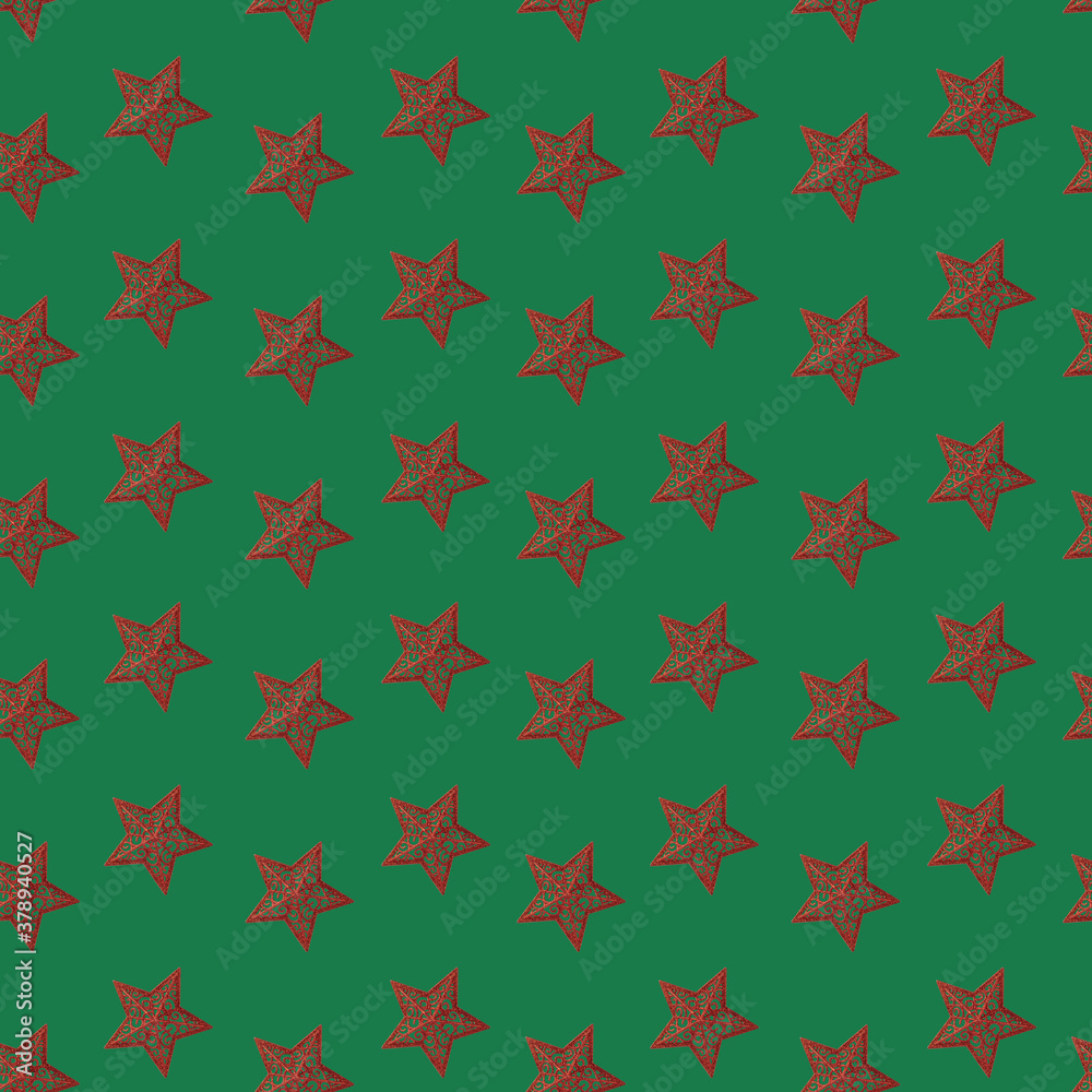A seamless pattern, Christmas red starlets on a green background. A seamless pattern, Christmas red starlets on a green background.