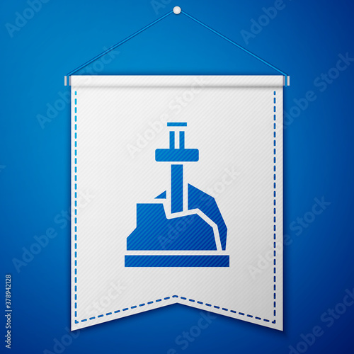 Blue Sword in the stone icon isolated on blue background. Excalibur the sword in the stone from the Arthurian legends. White pennant template. Vector.