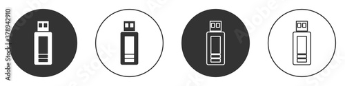 Black USB flash drive icon isolated on white background. Circle button. Vector.