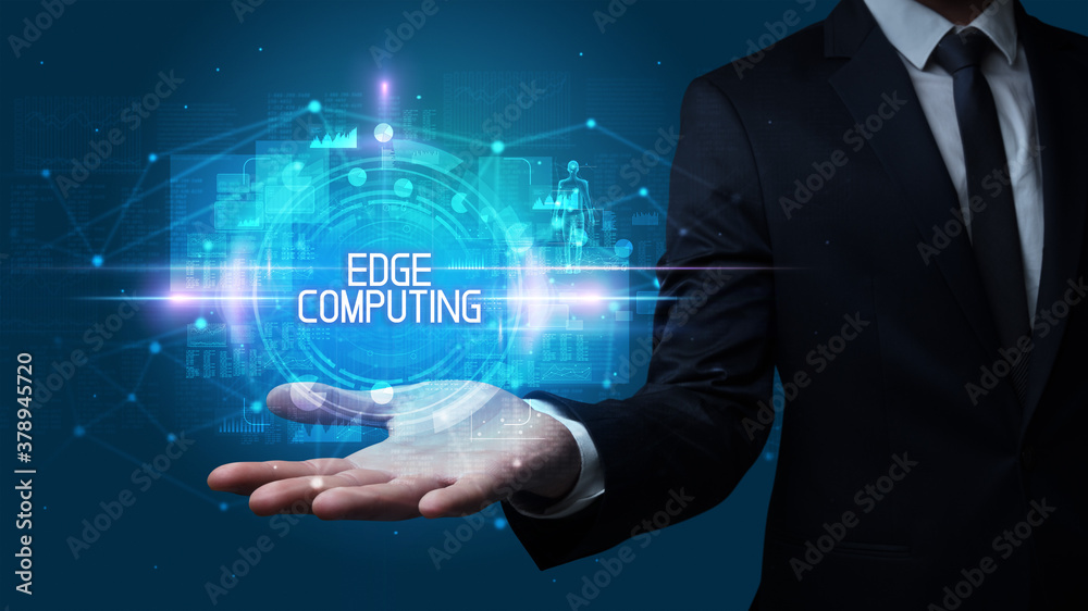 Man hand holding EDGE COMPUTING inscription, technology concept Man hand holding EDGE COMPUTING inscription, technology concept