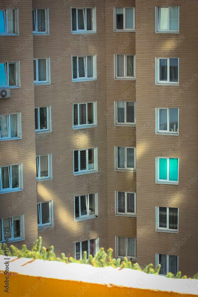 Windows in the multi-storey house, view from the balcony . High quality photo
