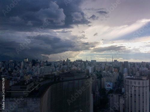 skyline city buildings cloudy rain