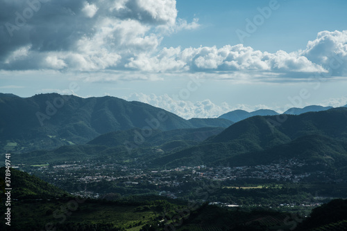 dramatic sunlit image of the caribbean mountains of dominican republic, san jose de ocoa. and taton mountainside.