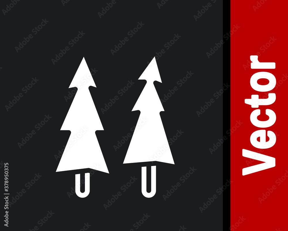 White Christmas tree icon isolated on black background. Merry Christmas and Happy New Year. Vector.