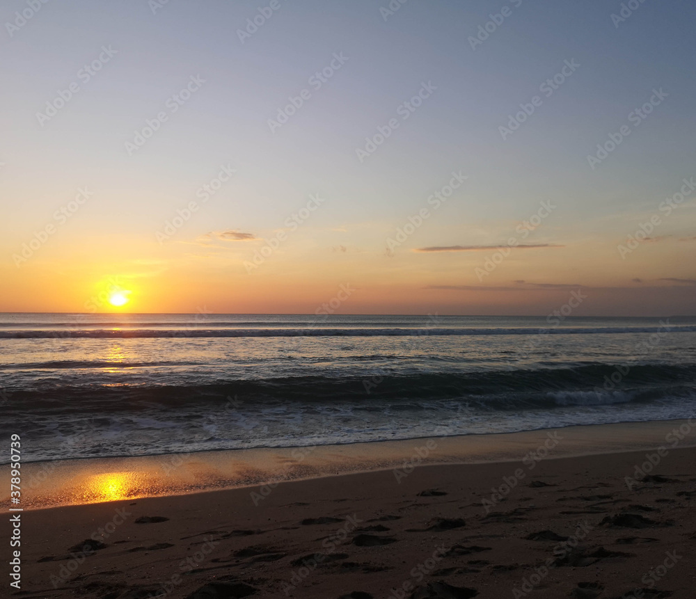 golden sunset sky on the beach
