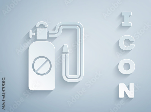 Paper cut Pressure sprayer for extermination of insects icon isolated on grey background. Pest control service. Disinfectant sprayer. Paper art style. Vector.