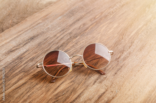 eyeglasses on wooden background