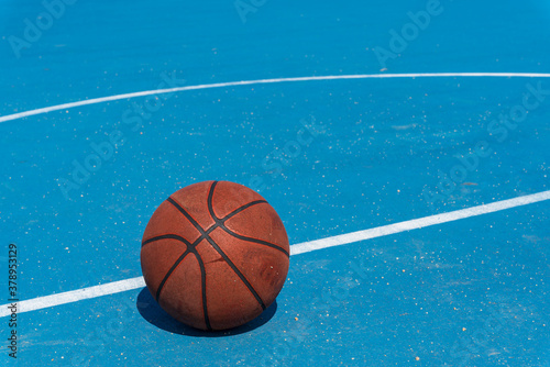 Basketball court where the blue sky shines © sand555