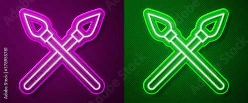 Glowing neon line Crossed medieval spears icon isolated on purple and green background. Medieval weapon. Vector.