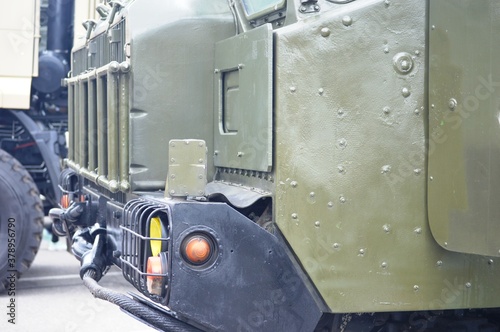 Exterior of a military vehicle on the street of a metropolis photo