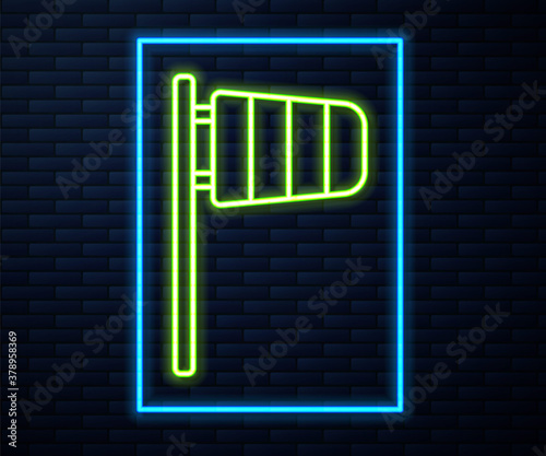Glowing neon line Cone meteorology windsock wind vane icon isolated on brick wall background. Windsock indicate the direction and strength of the wind. Vector.
