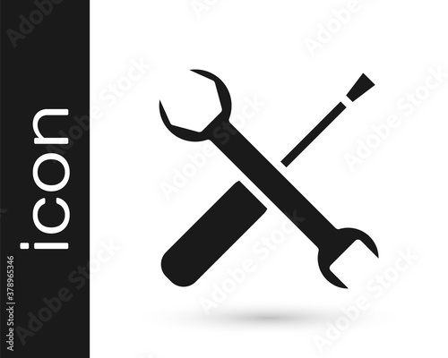 Grey Screwdriver and wrench spanner tools icon isolated on white background. Service tool symbol. Vector Illustration.