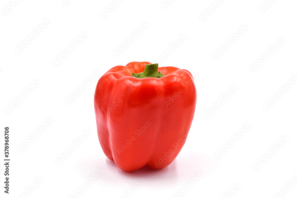 Red bell pepper on the light background.