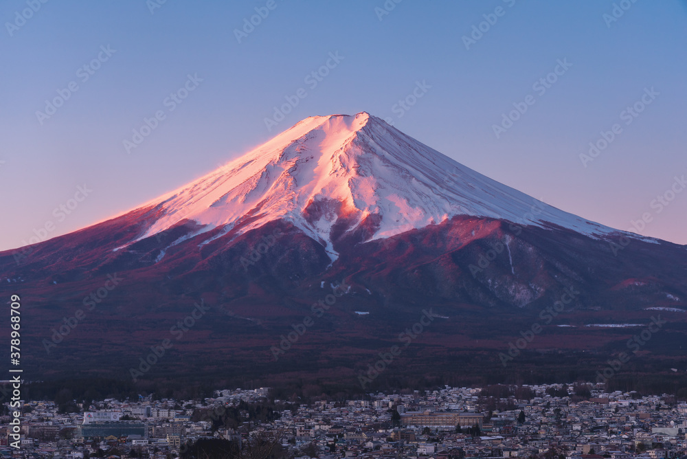 Fototapeta premium Close up fujisan mountain landscape view in sunrise light reflection above the crest of the Mountain crater.Japan natural landscape background