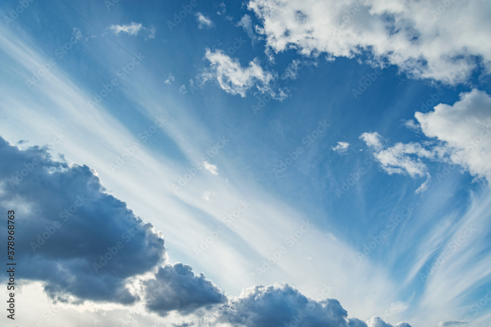 White clouds on the sky at evening time. White clouds on the sky at evening time.