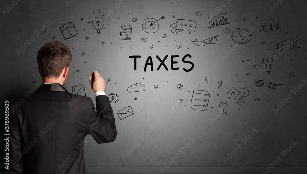 businessman drawing a creative idea sketch with TAXES inscription, business strategy concept