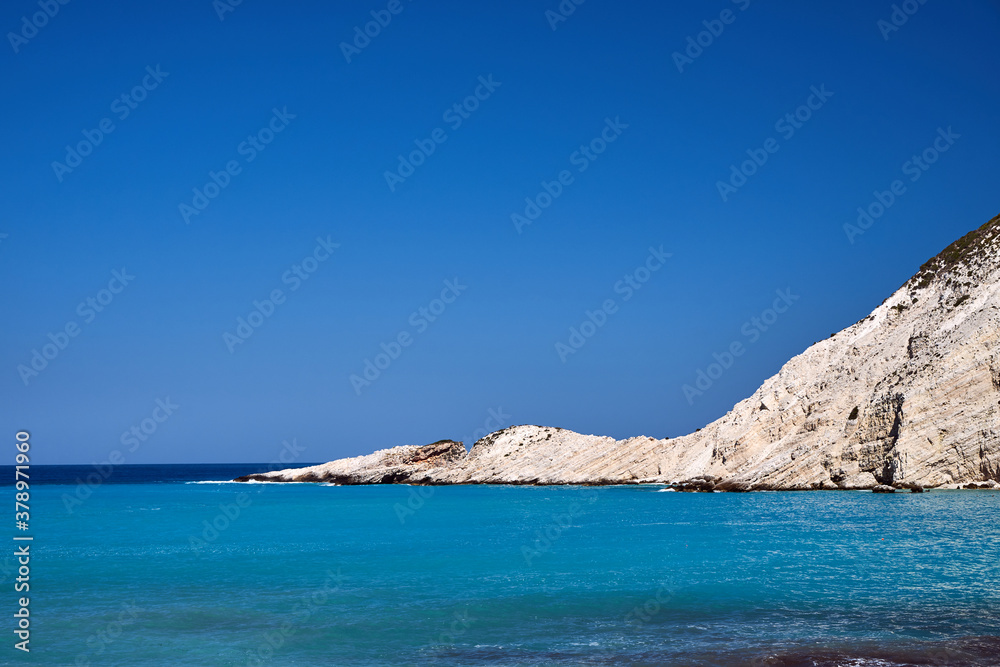 Rocky rocky headland at Petani Bay on the island of Kefalonia Rocky rocky headland at Petani Bay on the island of Kefalonia