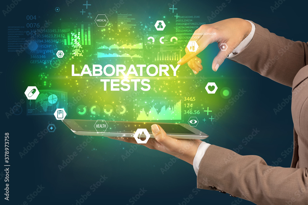 Obraz premium Close-up of a touchscreen with LABORATORY TESTS inscription, medical concept