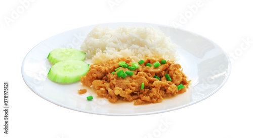 Fried pork with garlic rice dish on white background.