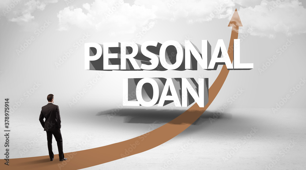 Fototapeta premium Rear view of a businessman standing in front of PERSONAL LOAN inscription, successful business concept