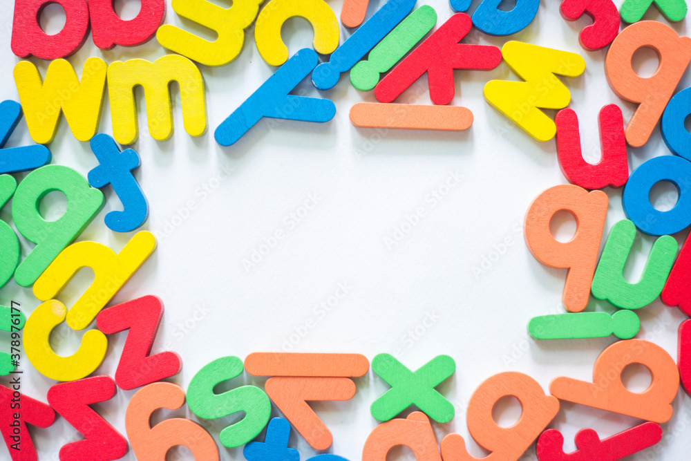 Multi colored English alphabet made from wood isolated on white background. Multi colored English alphabet made from wood isolated on white background.