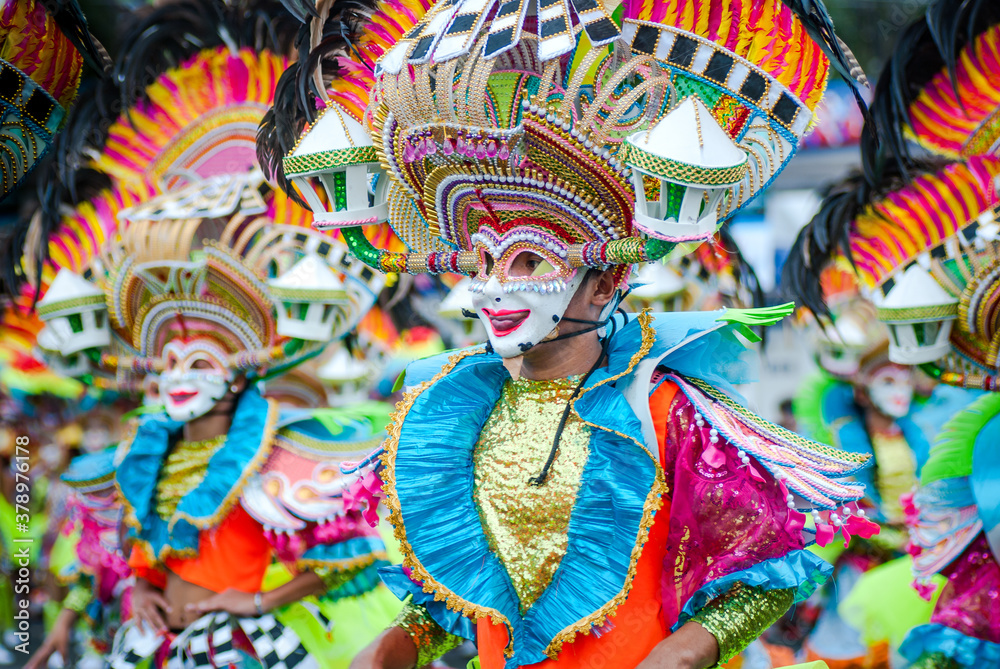 Colorful masks of street dacnce parade performer during Masskara Festival at Bacolod City, Philippines