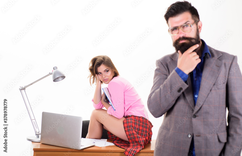 Obraz premium Sexy personal secretary. Full of desire. Having crush at work boost sexual desire. Bearded boss stand in front of sexy girl working laptop. Office manager or secretary. Sexy lady office worker