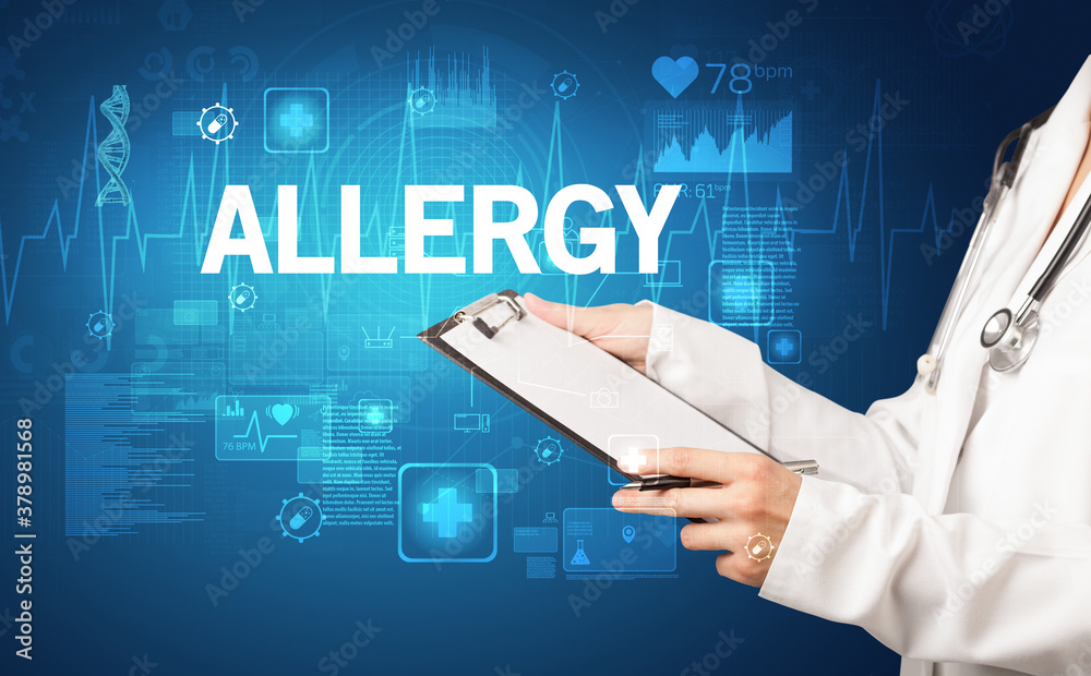 young doctor writing down notes with ALLERGY inscription, healthcare concept young doctor writing down notes with ALLERGY inscription, healthcare concept