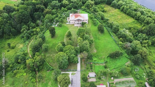 An abandoned estate in a picturesque place Khalch with beautiful nature. Gomel region, Vetka district. Aerial view photo