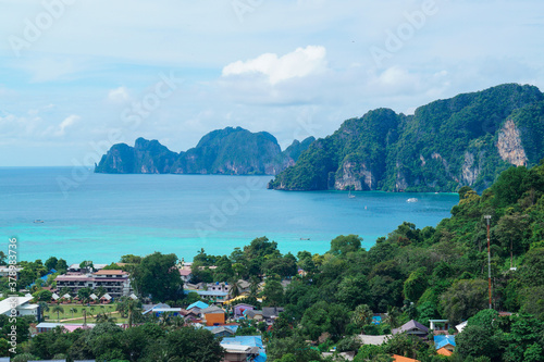 Stunning tropical rocks with palm trees in the Bay on Phi Phi island in Thailand. Landscape