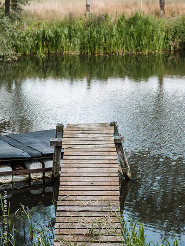 wooden pier on the lake © Samuel