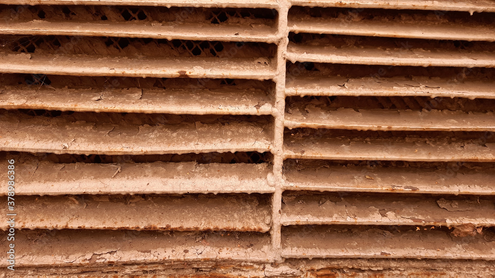 Old metal grating. Protection of internal content. The structure of communication. Old metal grating. Protection of internal content. The structure of communication.