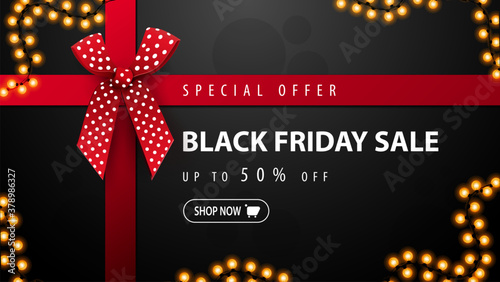 Special offer, Black friday sale, black discount banner in form of present box with red ribbons and red bow. Top view