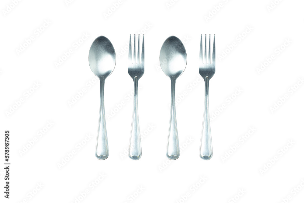 Isolated Spoon and Fork Silver ware is a kitchen utensil on a white background. Isolated Spoon and Fork Silver ware is a kitchen utensil on a white background.