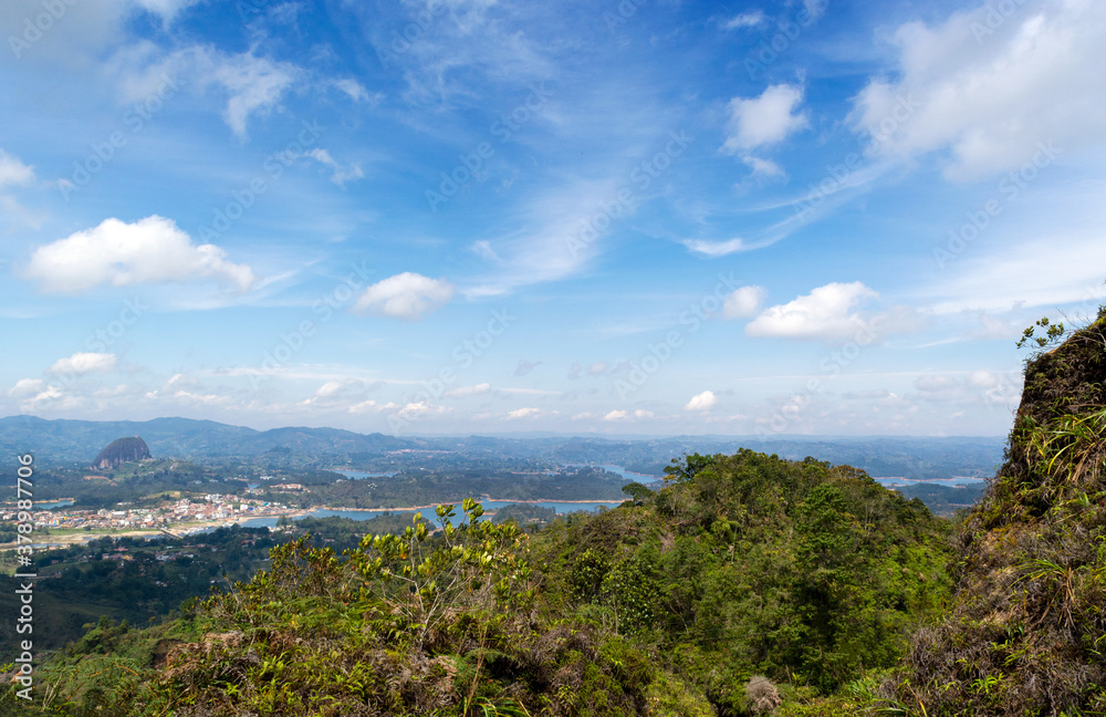 From the mountain, the town of Guatapé and its great rock