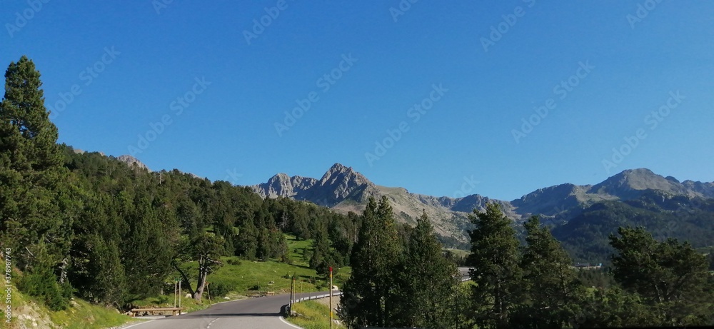 Mountainous landscape in summer seen from the road to the Grandvalira Grau Roig ski slopes in Andorra.