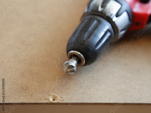 Countersink bit for electric drill, countersinking of screw holes with a cone head
