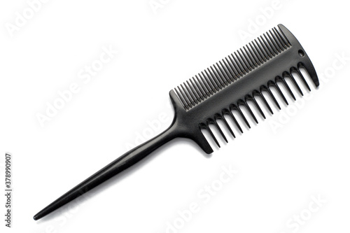 Black hairbrush on a white isolated background.