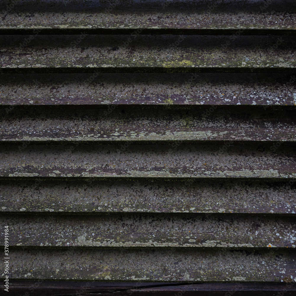 The texture of the wooden wall of planks