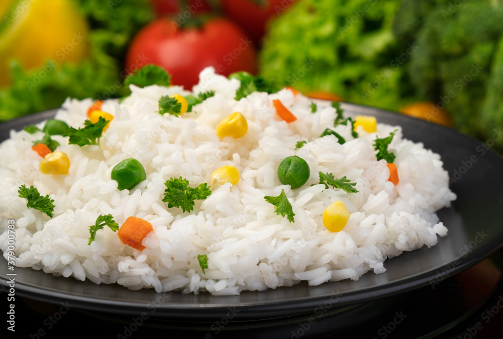 Cooked rice porridge, served with herbs and vegetables Cooked rice porridge, served with herbs and vegetables