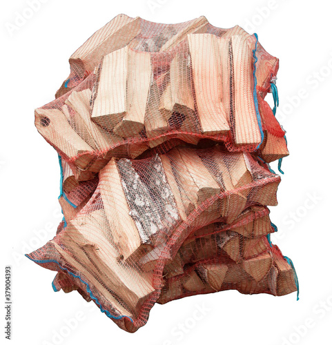 Birch firewood in a net for sale. Isolate on white background