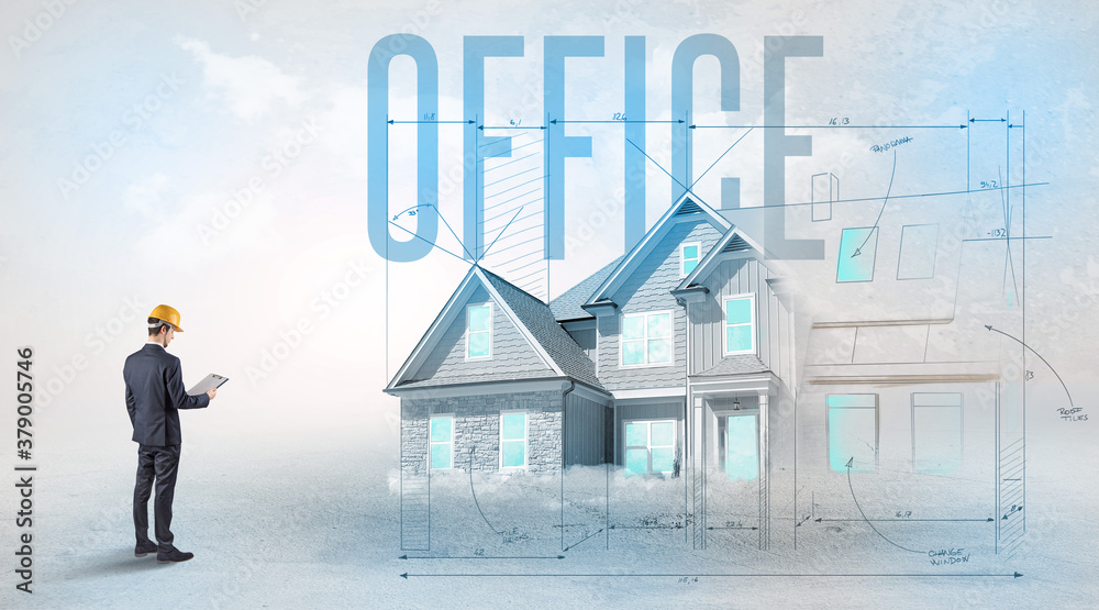 Young engineer holding blueprint with OFFICE inscription, house planning concept Young engineer holding blueprint with OFFICE inscription, house planning concept